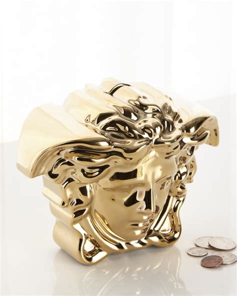 gold versace medusa piggy bank|Versace break the bank.